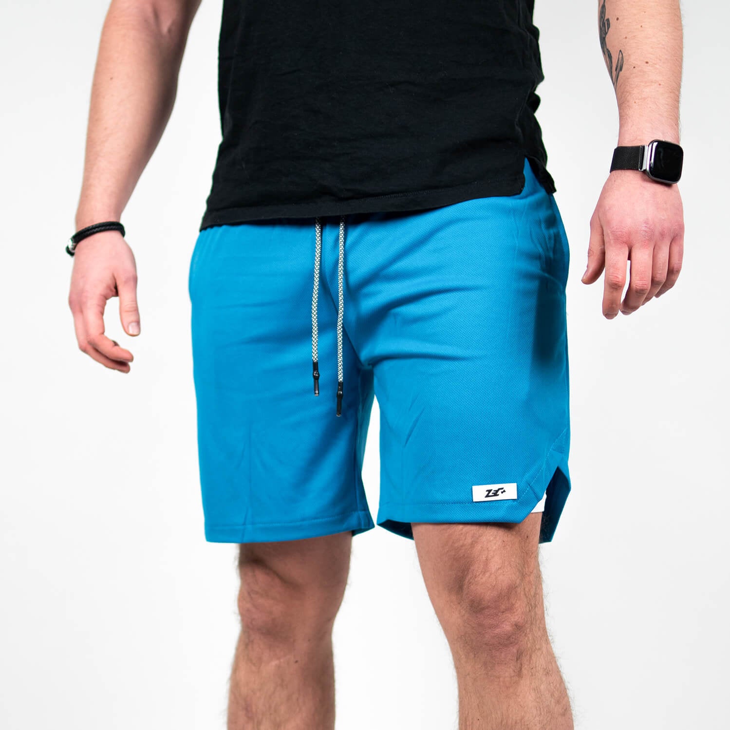 Hellblaue Zecplus Dual Shorts Herren Vorderseite mit Logo und Kordelzug