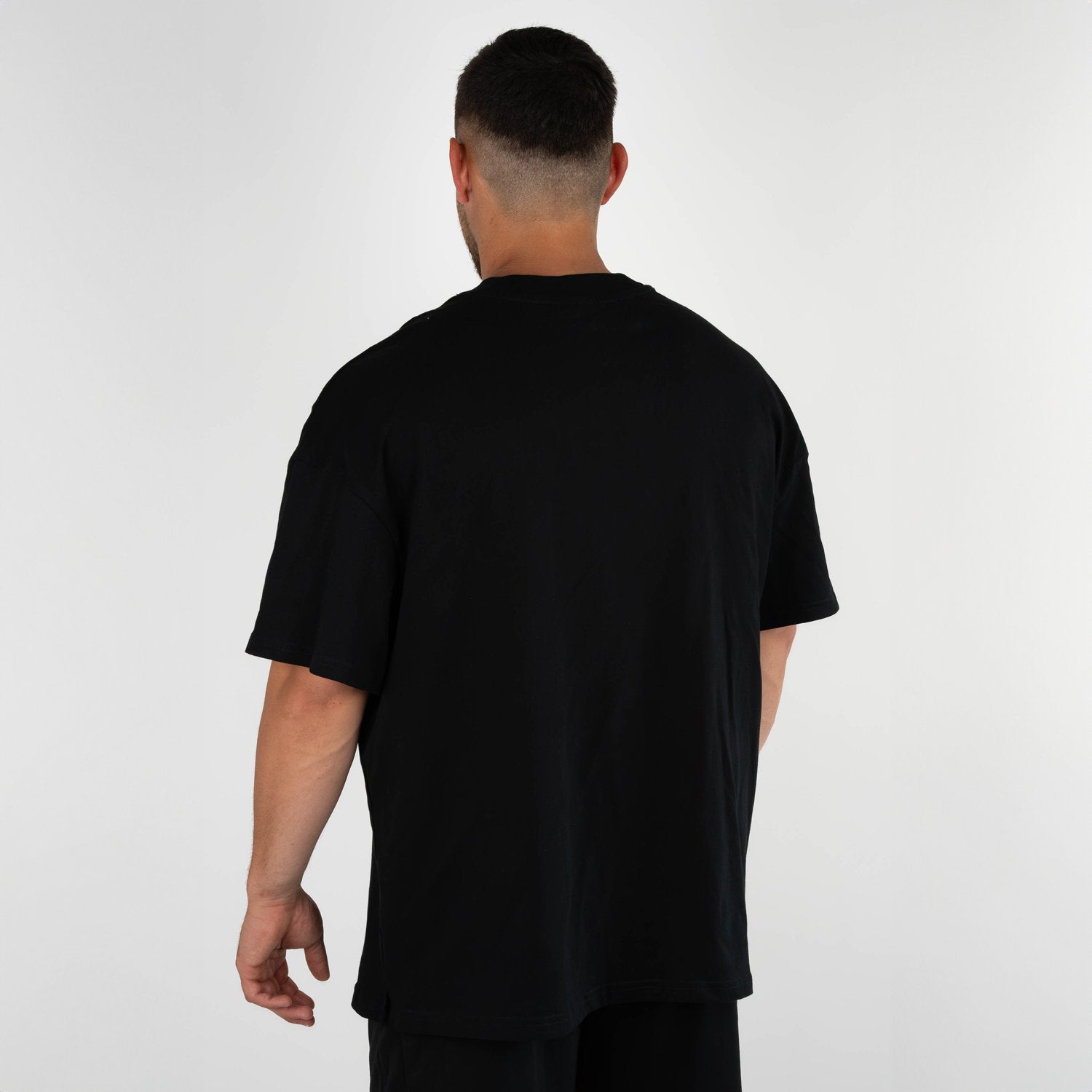 Schwarzes Oversized Herren-T-Shirt, Rückansicht ohne Aufdruck